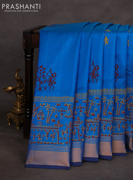 Uppada block printed saree cs blue and coffee brown with warli butta prints and long printed zari woven border