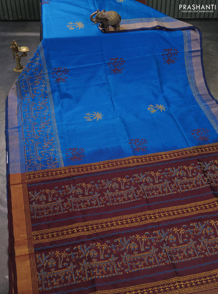 Uppada block printed saree cs blue and coffee brown with warli butta prints and long printed zari woven border