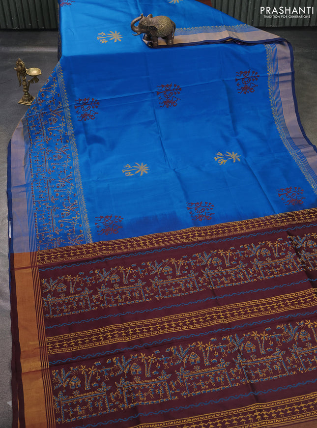 Uppada block printed saree cs blue and coffee brown with warli butta prints and long printed zari woven border