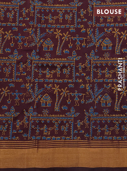 Uppada block printed saree cs blue and coffee brown with warli butta prints and long printed zari woven border