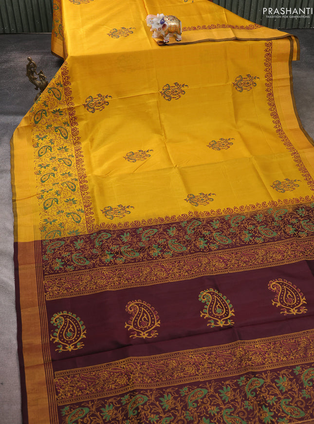 Uppada block printed saree mustard yellow and coffee brown with butta prints and long printed zari woven border