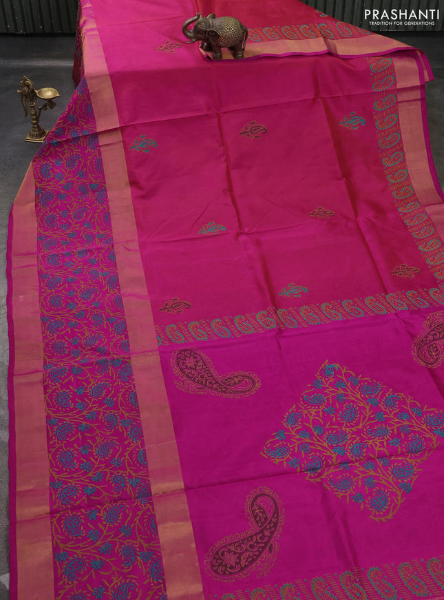 Uppada block printed saree dual shade of pinkish orange and pink with butta prints and long printed zari woven border