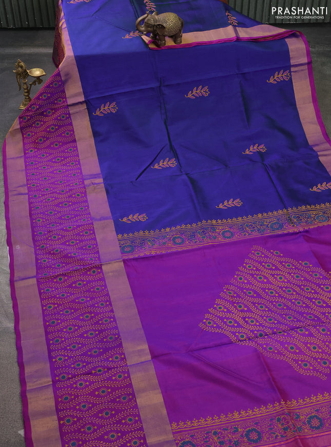 Uppada block printed saree dual shade of bluish green and purple with butta prints and long printed zari woven border