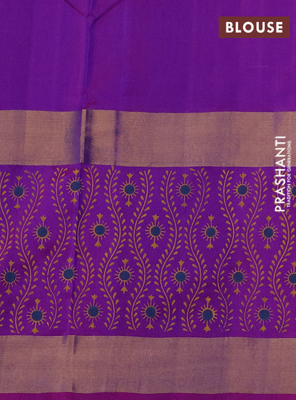 Uppada block printed saree dual shade of bluish green and purple with butta prints and long printed zari woven border