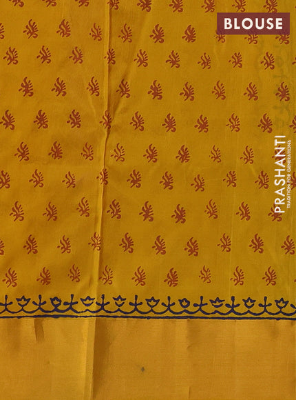Uppada block printed saree purple and mustard yellow with floral prints and zari woven border