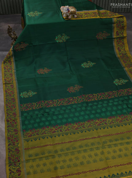 Uppada block printed saree bottle green and mustard yellow with butta prints and printed border