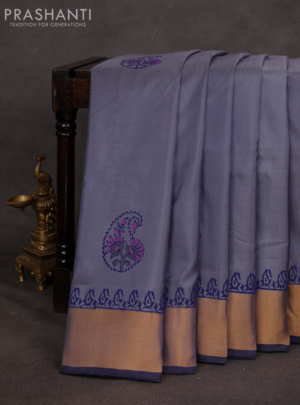 Uppada block printed saree greyish blue and navy blue with butta prints and zari woven border