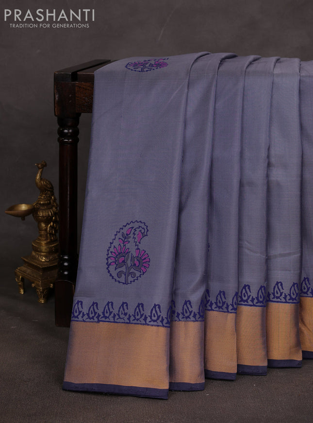 Uppada block printed saree greyish blue and navy blue with butta prints and zari woven border