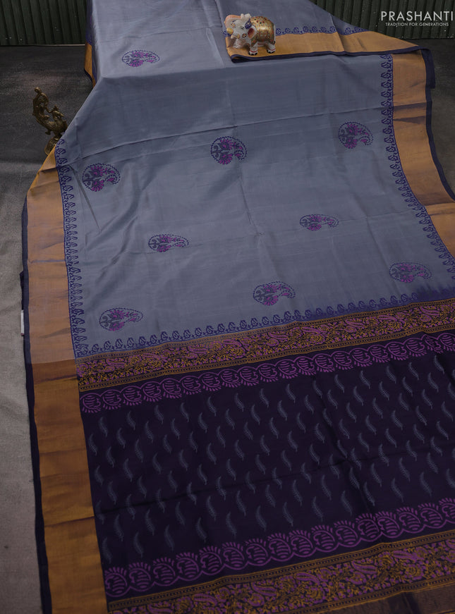 Uppada block printed saree greyish blue and navy blue with butta prints and zari woven border
