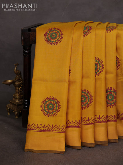 Uppada block printed saree mustard yellow and coffee brown with butta prints and zari woven border