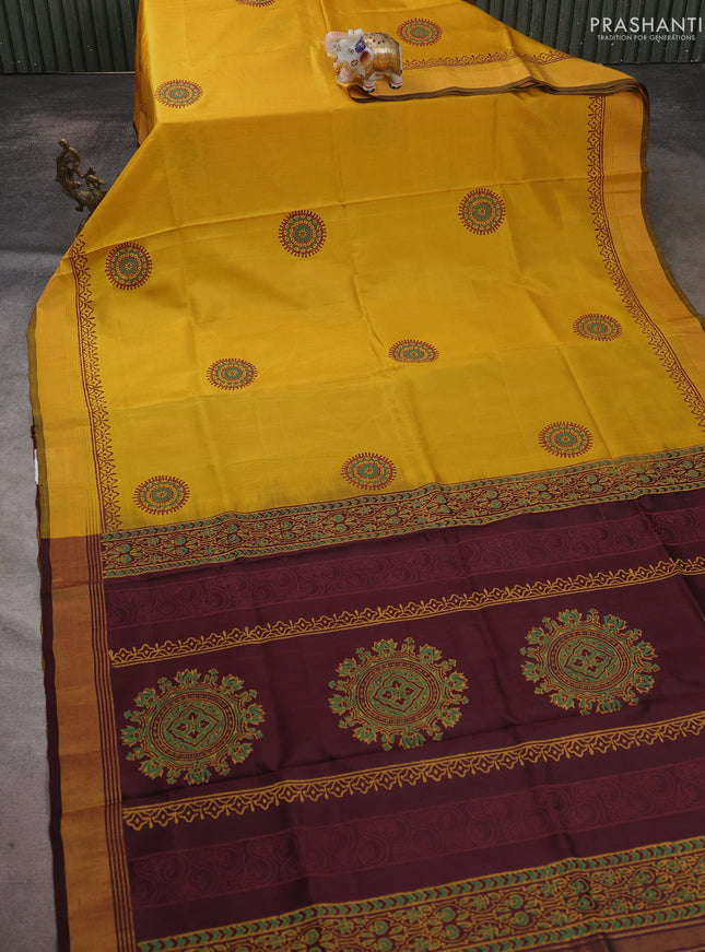 Uppada block printed saree mustard yellow and coffee brown with butta prints and zari woven border