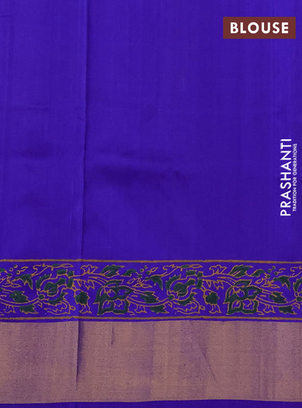 Uppada block printed saree dual shade of green and blue with floral prints and zari woven border