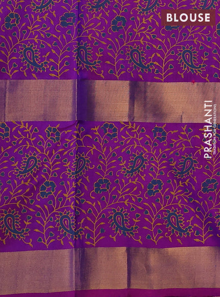 Uppada block printed saree blue and purple with paisley butta prints and long rettapet zari woven printed border