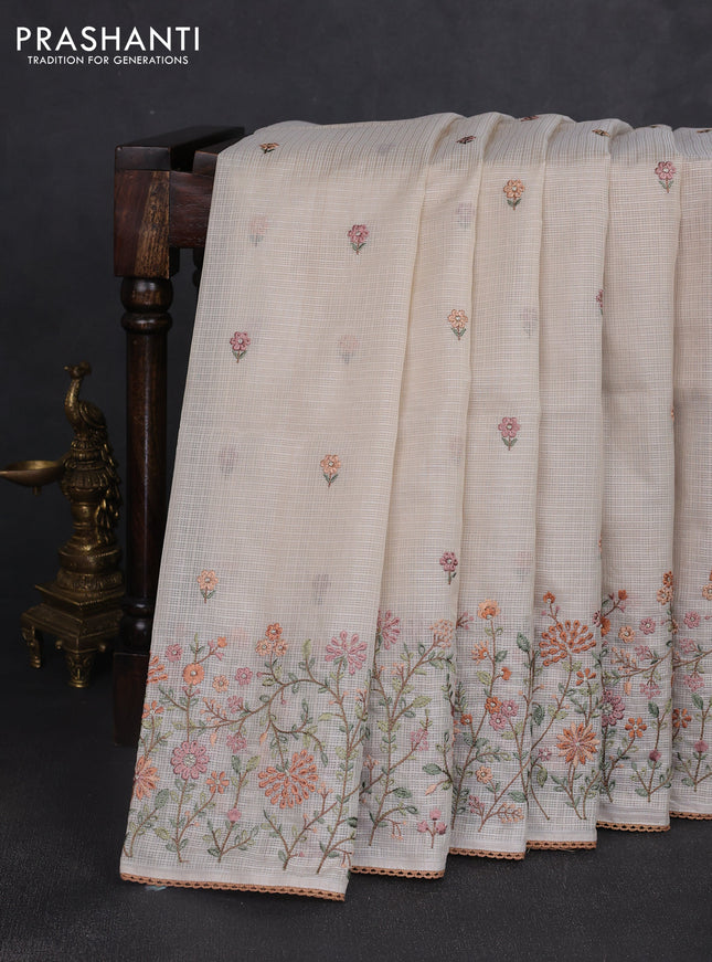 Kota silk saree beige and rust shade with embroidery work and floral embroidery corcia lace border