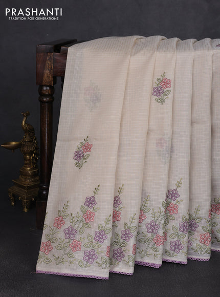 Kota silk saree beige and mild lavender with embroidery work and floral embroidery corcia lace border