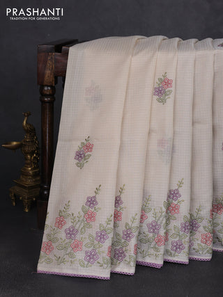 Kota silk saree beige and mild lavender with embroidery work and floral embroidery corcia lace border