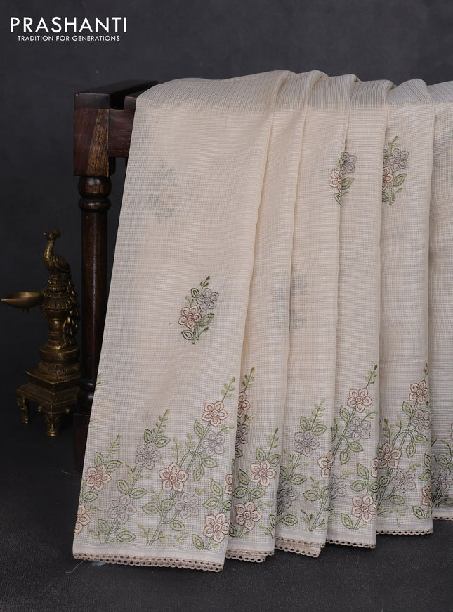 Kota silk saree beige with embroidery work and floral embroidery corcia lace border