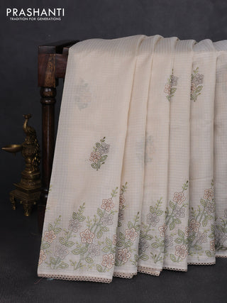 Kota silk saree beige with embroidery work and floral embroidery corcia lace border