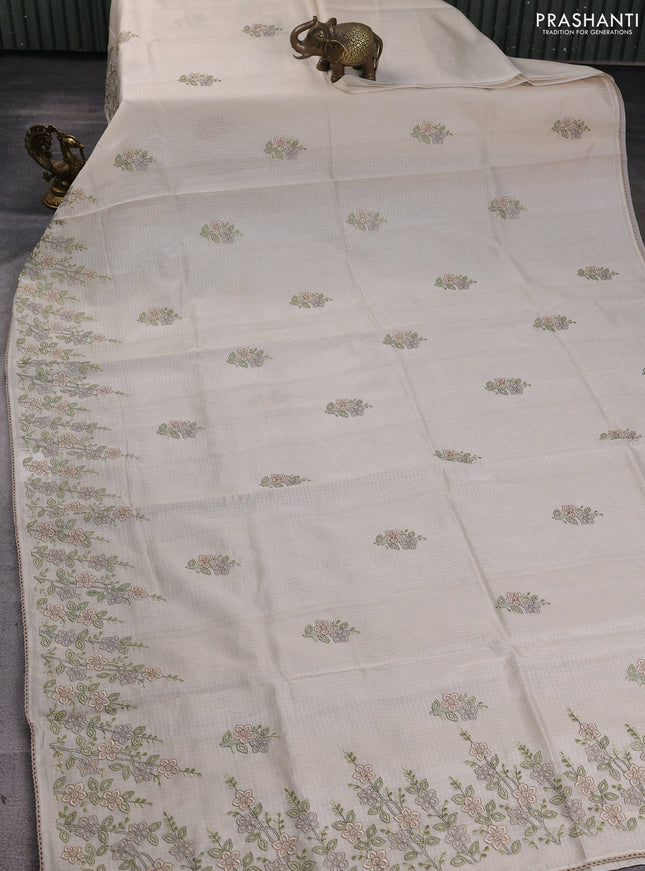 Kota silk saree beige with embroidery work and floral embroidery corcia lace border