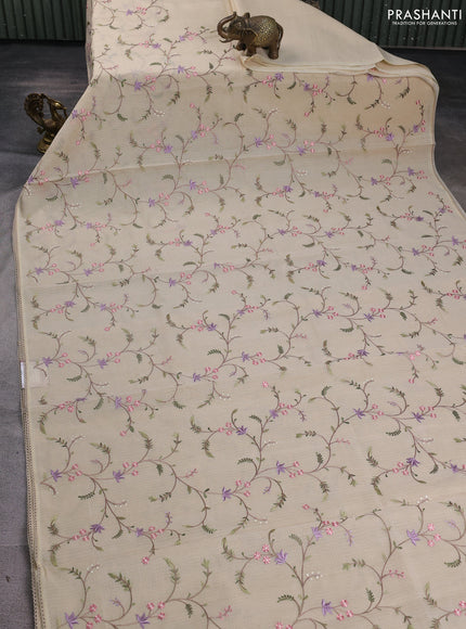 Kota silk saree beige with allover embroidery work and crocia lace border