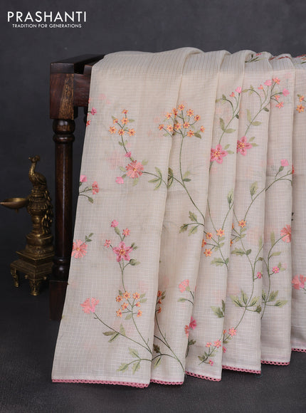 Kota silk saree beige and mild peach pink with allover embroidery work and crocia lace border