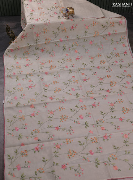 Kota silk saree beige and mild peach pink with allover embroidery work and crocia lace border