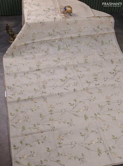 Kota silk saree beige with allover embroidery work and crocia lace border