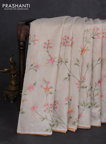 Kota silk saree beige and pale orange with allover embroidery work and crocia lace border
