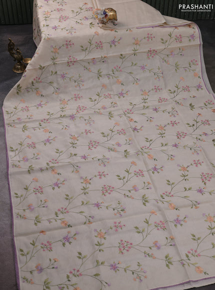 Kota silk saree beige and lavender with allover embroidery work and crocia lace border