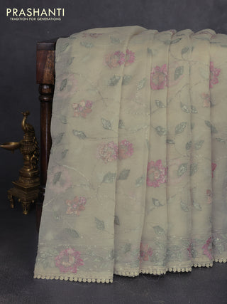 Pure organza silk saree beige with allover embroidery sequin work and embroidery crocia lace work border