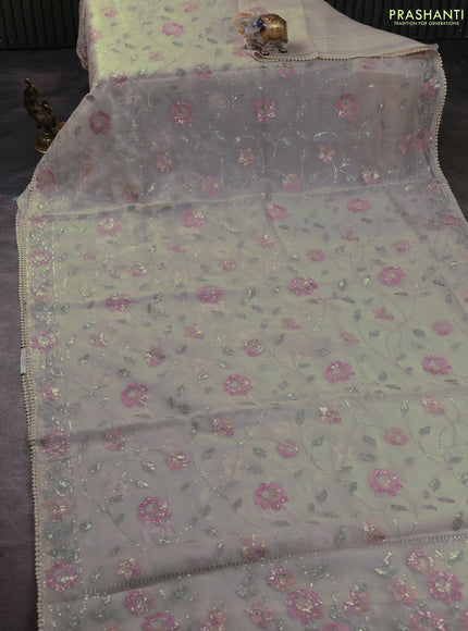 Pure organza silk saree beige with allover embroidery sequin work and embroidery crocia lace work border