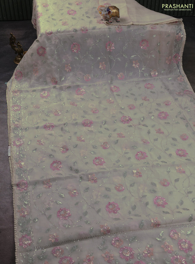 Pure organza silk saree beige with allover embroidery sequin work and embroidery crocia lace work border