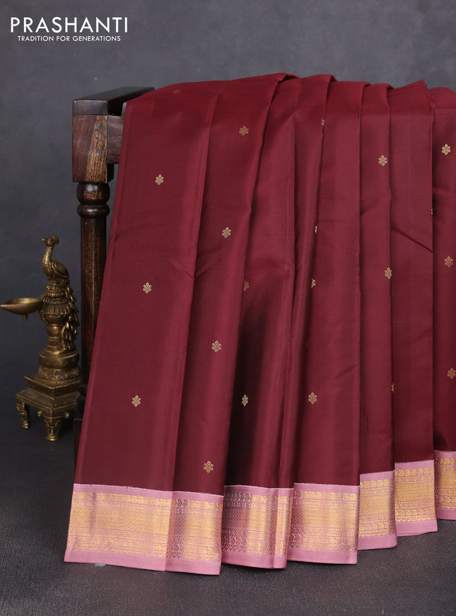 Pure kanchipuram silk saree maroon and dark peach with zari woven buttas and rich zari woven korvai border