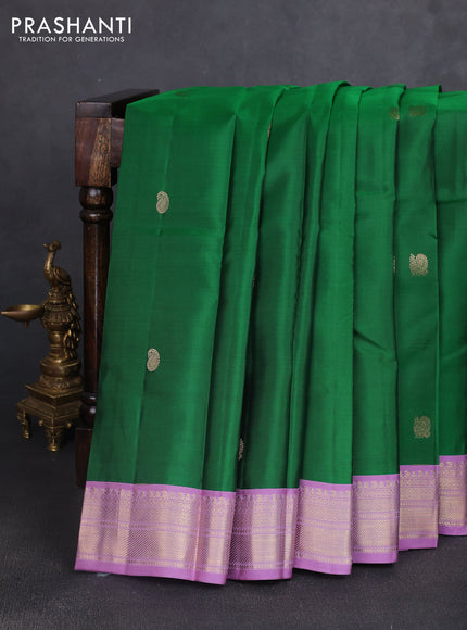 Pure kanchipuram silk saree green and lavender with zari woven buttas and rich zari woven korvai border
