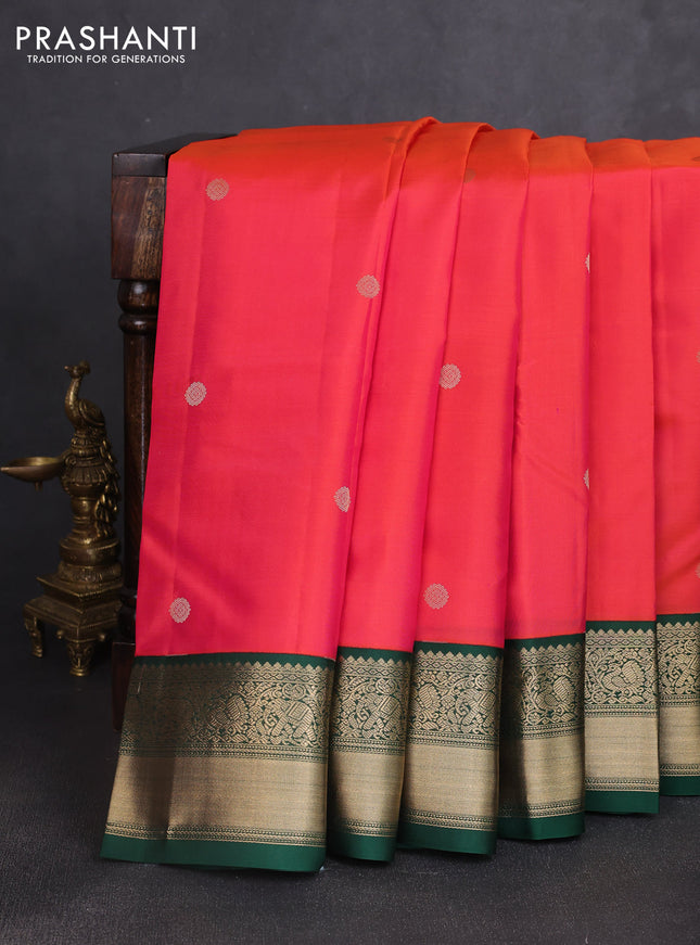 Pure kanchipuram silk saree dual shade of pinkish orange and green with zari woven buttas and rich zari woven korvai border