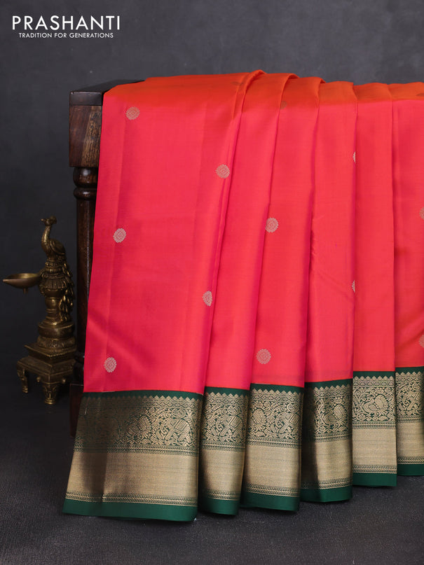 Pure kanchipuram silk saree dual shade of pinkish orange and green with zari woven buttas and rich zari woven korvai border