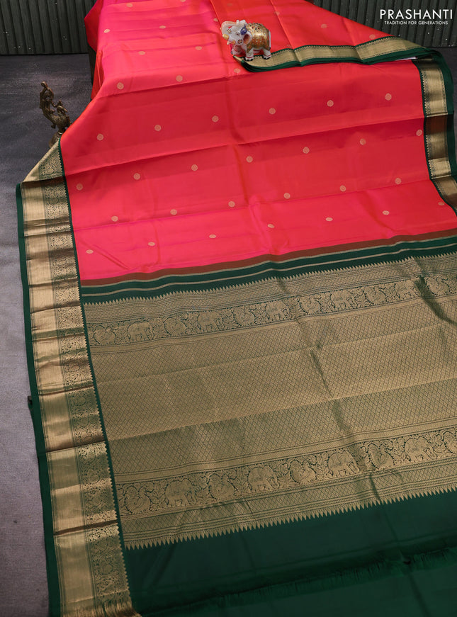 Pure kanchipuram silk saree dual shade of pinkish orange and green with zari woven buttas and rich zari woven korvai border
