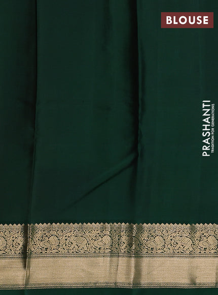 Pure kanchipuram silk saree dual shade of pinkish orange and green with zari woven buttas and rich zari woven korvai border