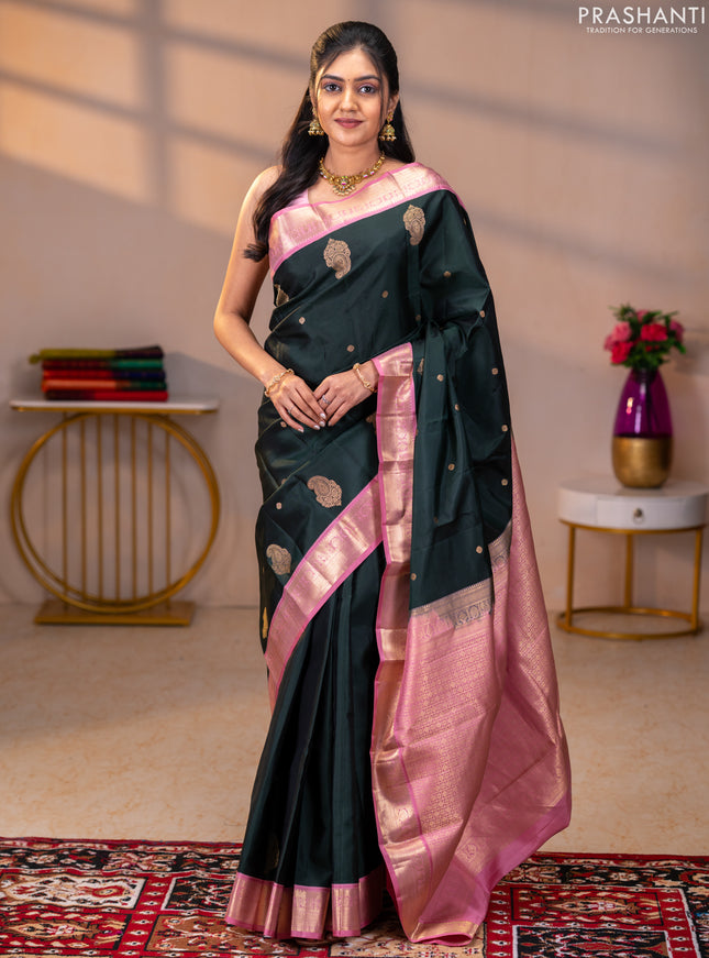 Pure kanchipuram silk saree bottle green and pastel pink with zari woven buttas and rich zari woven korvai border
