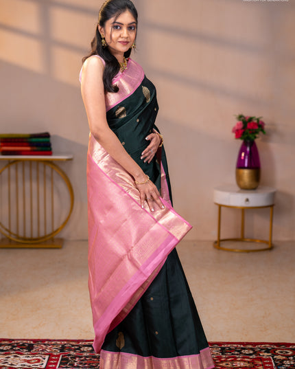 Pure kanchipuram silk saree bottle green and pastel pink with zari woven buttas and rich zari woven korvai border