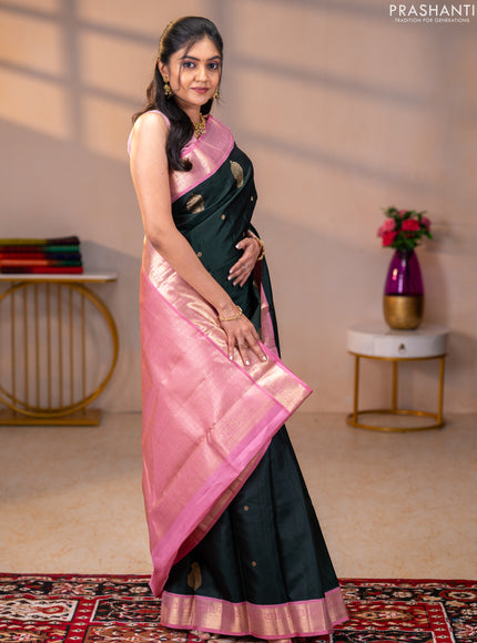 Pure kanchipuram silk saree bottle green and pastel pink with zari woven buttas and rich zari woven korvai border