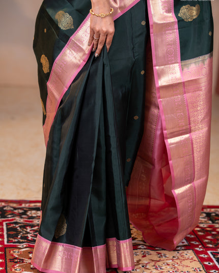 Pure kanchipuram silk saree bottle green and pastel pink with zari woven buttas and rich zari woven korvai border