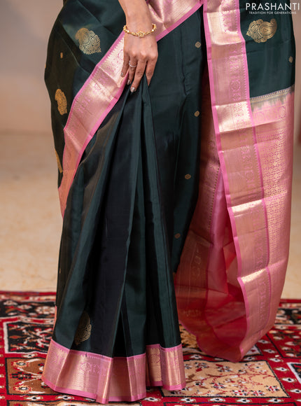 Pure kanchipuram silk saree bottle green and pastel pink with zari woven buttas and rich zari woven korvai border