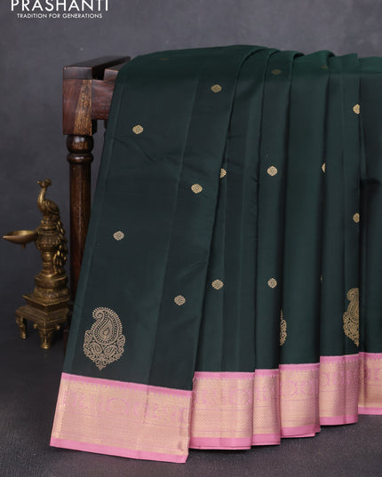 Pure kanchipuram silk saree bottle green and pastel pink with zari woven buttas and rich zari woven korvai border