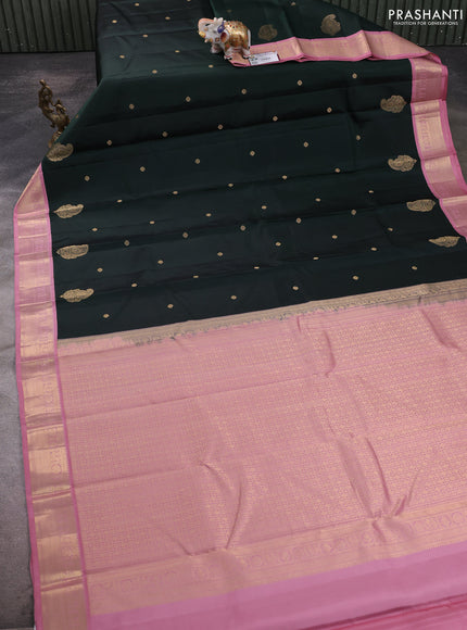 Pure kanchipuram silk saree bottle green and pastel pink with zari woven buttas and rich zari woven korvai border