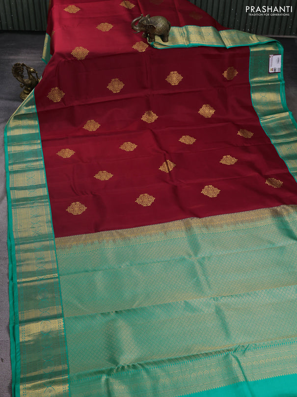 Pure kanchipuram silk saree red and teal blue with zari woven buttas and zari woven korvai border