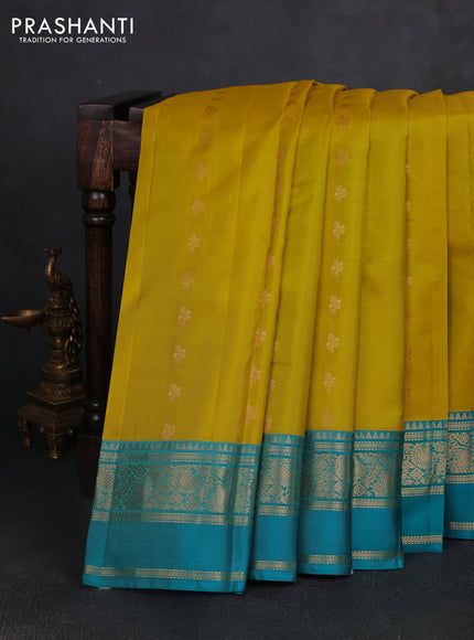 Pure kanchipuram silk saree lime yellow and teal blue with allover zari woven buttas and rettapet zari woven korvai border