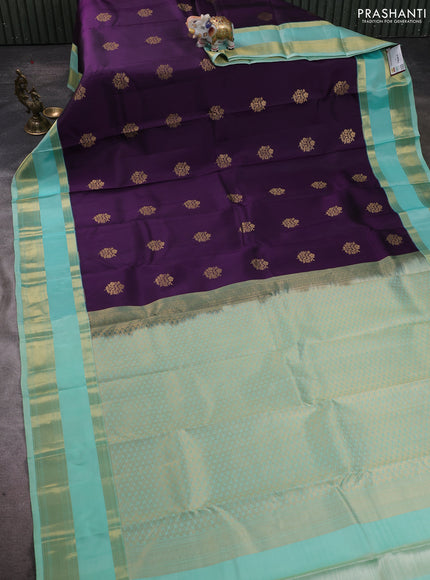Pure kanchipuram silk saree deep purple and teal blue with zari woven buttas and rettapet zari woven border