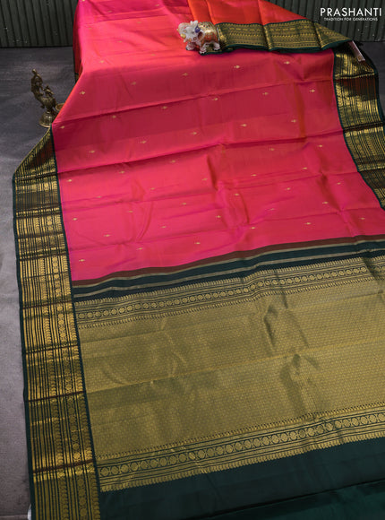 Pure kanchipuram silk saree dual shade of pinkish orange and bottle green with zari woven buttas and zari woven korvai border