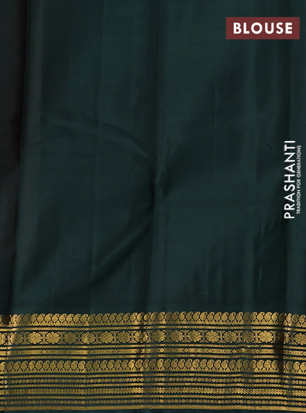 Pure kanchipuram silk saree dual shade of pinkish orange and bottle green with zari woven buttas and zari woven korvai border